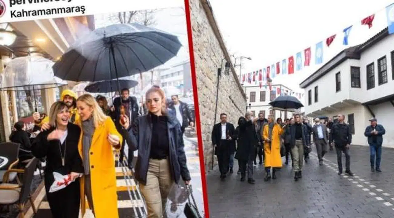 Kültür ve Turizm Bakanı'nın eşi Pervin Ersoy, polis memuruna şemsiye tutturup çantasını taşıttı