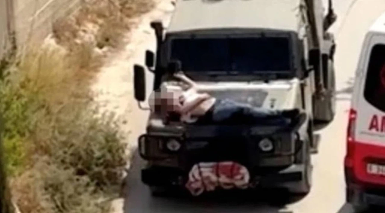 İsrail kuvvetleri, yaralı bir Filistinliyi askeri aracın kaputuna bağladı