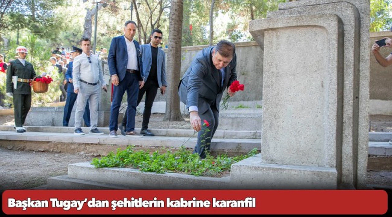 Başkan Tugay’dan şehitlerin kabrine karanfil
