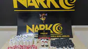 Turgutlu'da zehir tacirlerine narkotik darbesi: Binlerce hap ele geçirildi