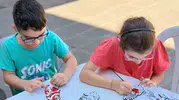 Minik ellerden milli dokunuş: Hacivat ve Karagöz ay-yıldızlı renklerle buluştu