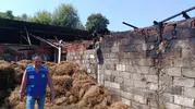 Ortaca’da ahır yangınında 500 balyası kül olan üreticiye Büyükşehir’den dayanışma eli