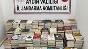 Kuşadası’nda gece pazarında korsan kitap operasyonu: Yüzlerce esere el konuldu