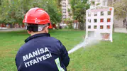 Minik kahramanlar itfaiye merkezinde: Yangın güvenliğini uygulamalı öğrendiler