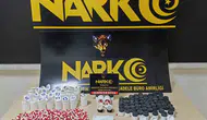 Turgutlu'da zehir tacirlerine narkotik darbesi: Binlerce hap ele geçirildi
