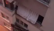 Denizli'de nefes kesen kurtarma: Balkonda asılı kalan yavrusunu bırakmadı