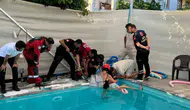 Seydikemer'de korku dolu anlar: Minik T.A. havuzun emiş borusundan son anda kurtarıldı