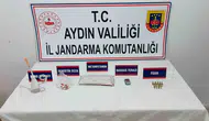 Kuşadası'nda şafak operasyonu: Zehir tacirlerinin evinden cephanelik çıktı