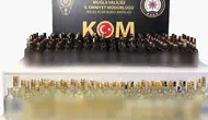 Milas trafiğinde kaçak içki operasyonu: Şüpheli araçtan cephanelik çıktı