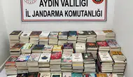 Kuşadası’nda gece pazarında korsan kitap operasyonu: Yüzlerce esere el konuldu