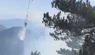 Fethiye'de ormanlık alanda zorlu mücadele: Alevler havadan müdahale ile söndürüldü
