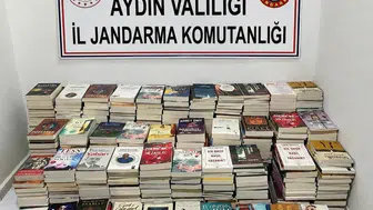 Kuşadası’nda gece pazarında korsan kitap operasyonu: Yüzlerce esere el konuldu