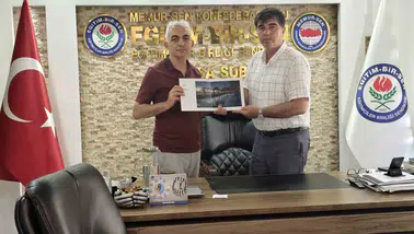 Manisa'nın objektifinden Türkiye birinciliği: İsmail Aybey'e sendikadan özel kutlama