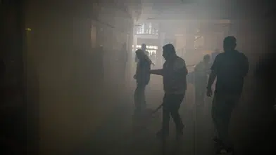 İzmir'de Büyükşehir Belediyesi'nden deprem ve yangın tatbikatı: Güvenli tahliye başarıyla gerçekleştirildi.