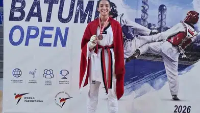 Aliağalı Merve Nisa zirveye çıktı: İstiklal Marşı’nı Gürcistan’da dinletti
