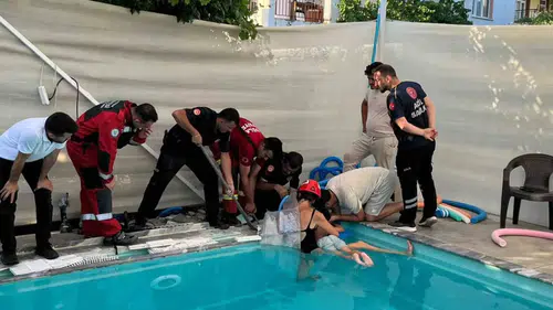 Seydikemer'de korku dolu anlar: Minik T.A. havuzun emiş borusundan son anda kurtarıldı