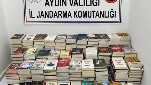 Kuşadası’nda gece pazarında korsan kitap operasyonu: Yüzlerce esere el konuldu