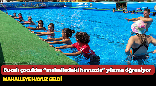 Bucalı çocuklar “mahalledeki havuzda” yüzme öğreniyor