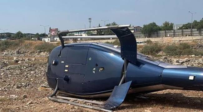 İzmir'de sivil bir helikopter kalkış esnasında yan yattı