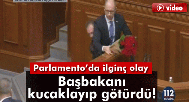 Başbakanı kucaklayıp götürdü