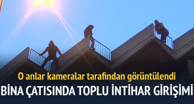 Bina çatısında toplu intihar girişimi