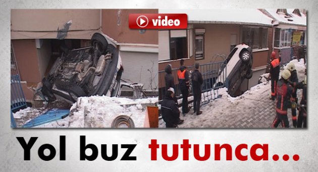 Buz tutan yolda kontrolden çıkan araç, bina boşluğuna uçtu