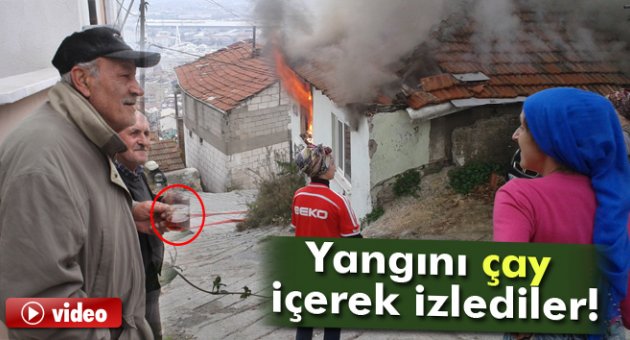 Gecekondu alev alev yandı, vatandaş çay içerek izledi