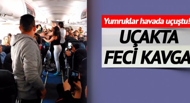 Kadınlar uçakta birbirine girdi