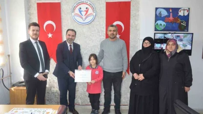 Tavşanlı’da dereceye giren öğrenciye tebrik ziyareti