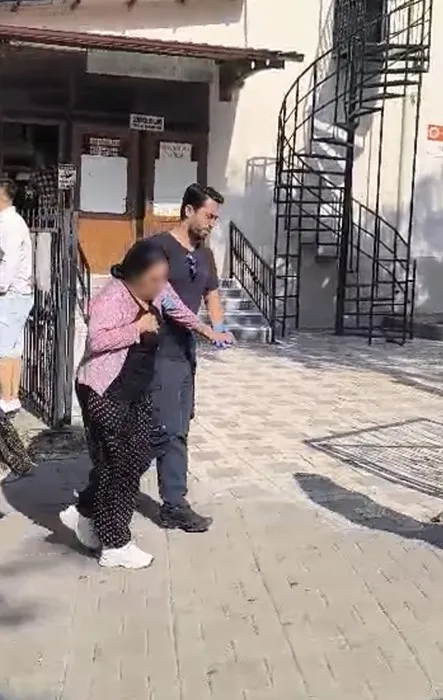 Turgutlu'da emlak vurgunu iddiası: Çatıya çıkan kadın dehşet saçtı