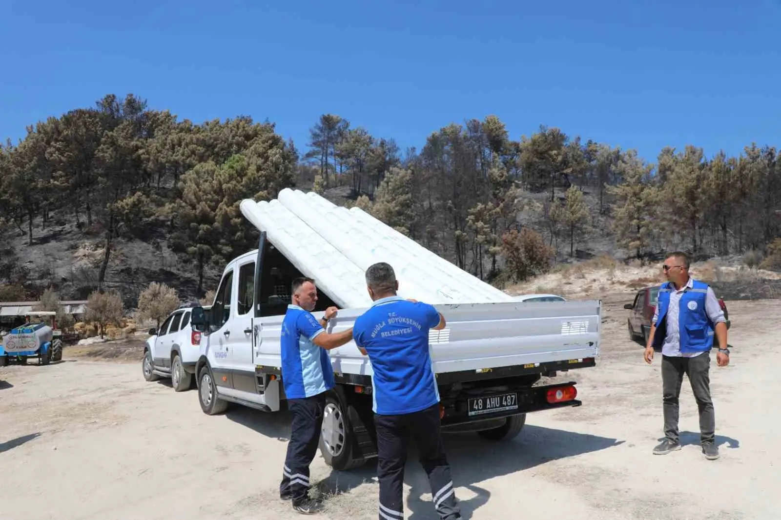 Seydikemer’de yangın felaketinin izleri hızla siliniyor: Üreticiye can suyu desteği